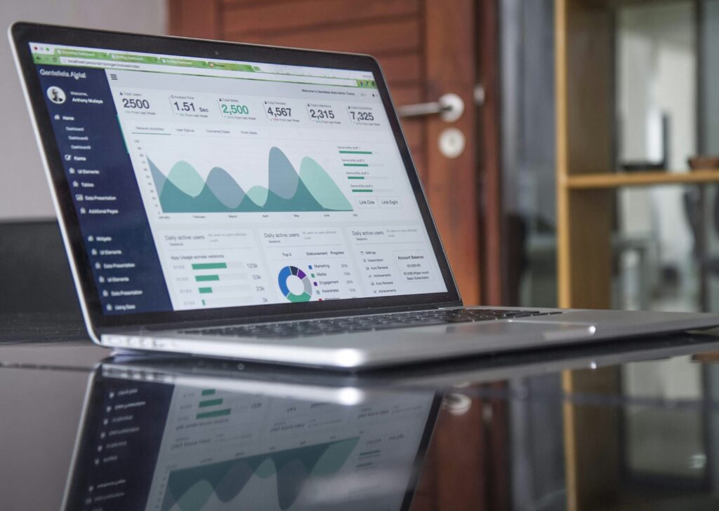 An example interface that looks like a unified DSP, with graphs, user numbers, and other data on a laptop screen.